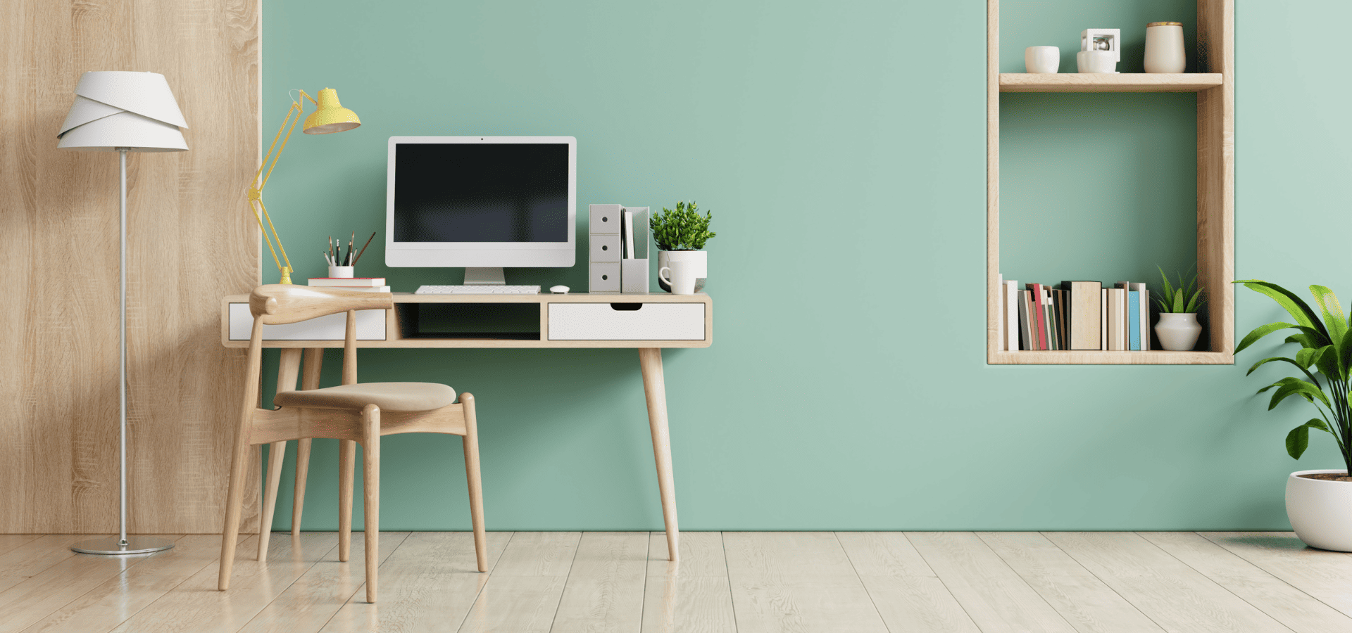 Green-themed home office with wood elements
