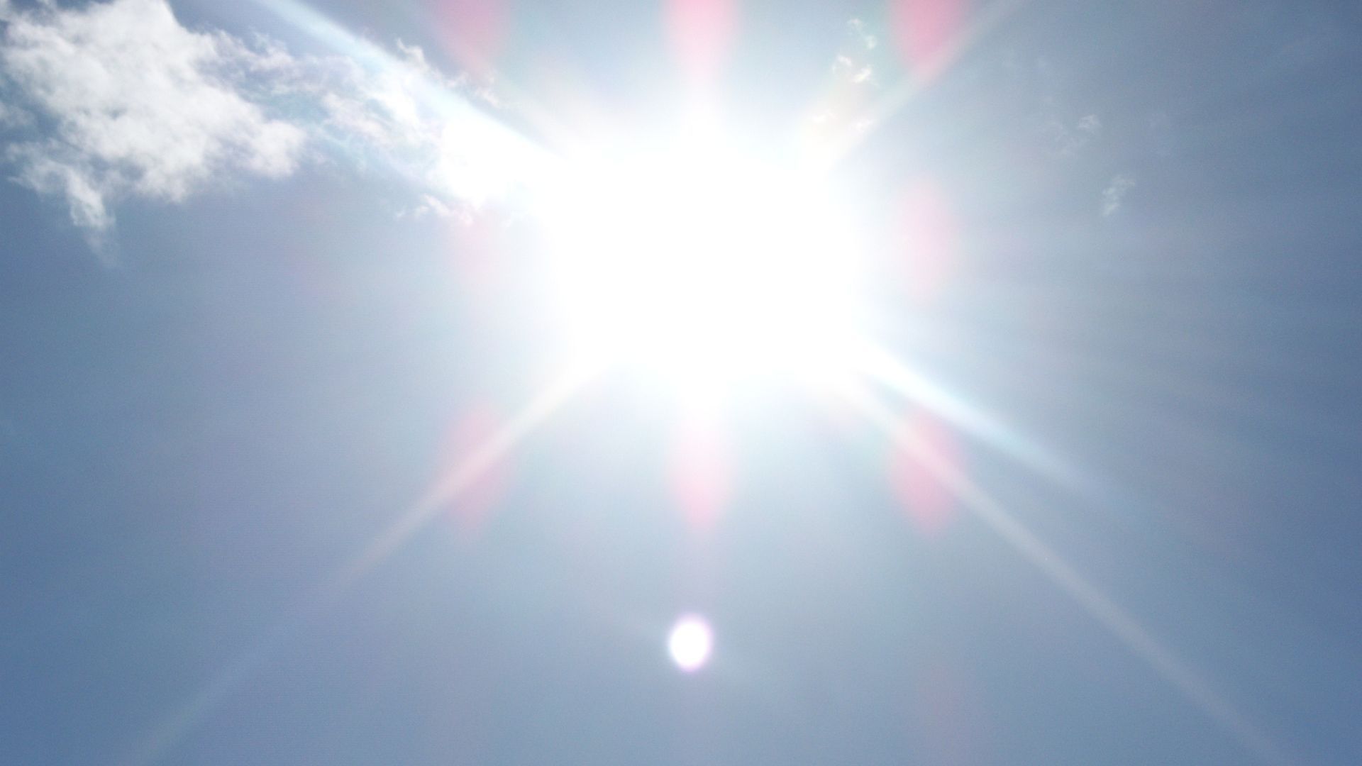 Bright sunlight with rays and a blue sky, typical of sunny Stockton.