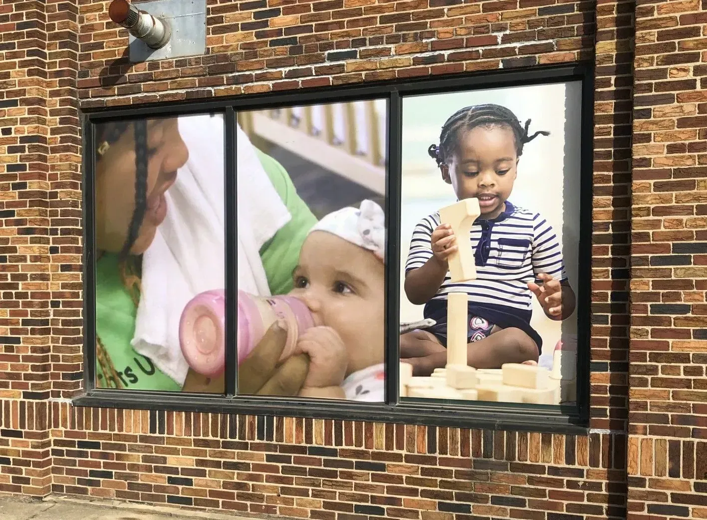 Political campaign sign for 'VJ' Johnson, DC Council Ward 7, with his photo and slogan