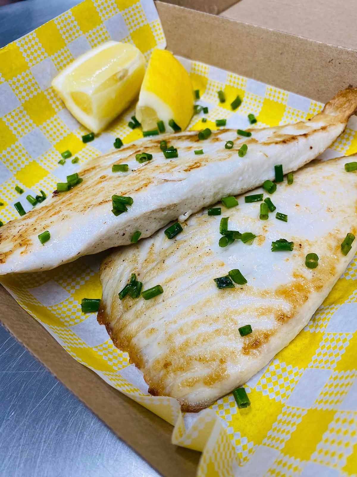 A Close Up of a Fried Fish — Cedar Park Fish & Chips In Taranganba, QLD