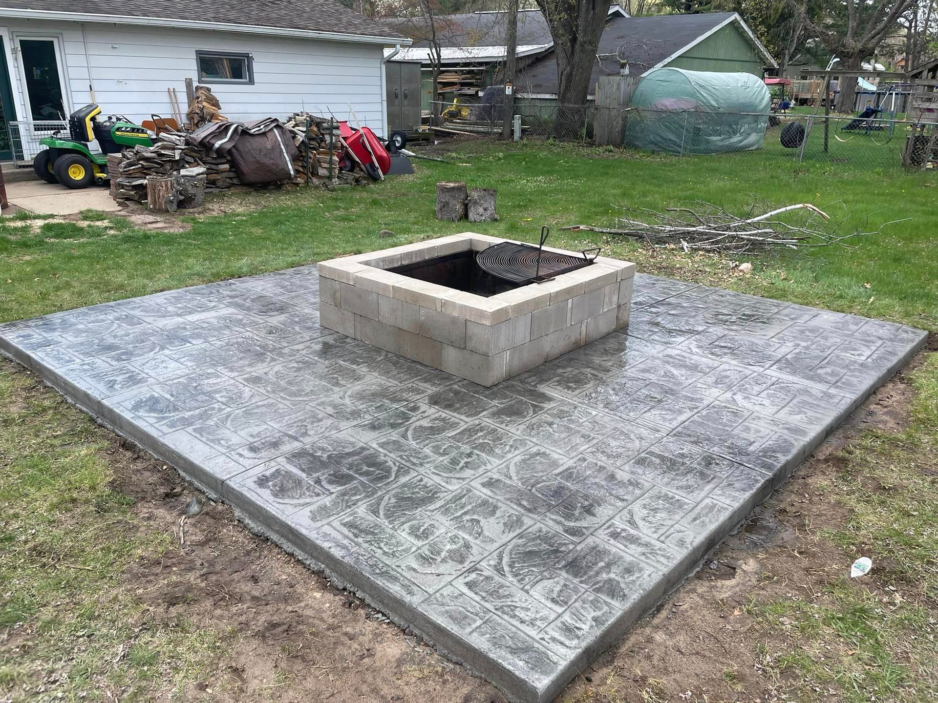 There Is a Fire Pit in The Middle of The Patio | Altoona, WI | Xtreme Klean