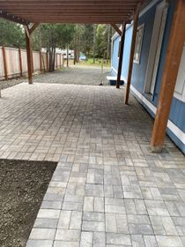 Backyard paver patio installed by Tony's Landscape Maintenance in Shelton, WA