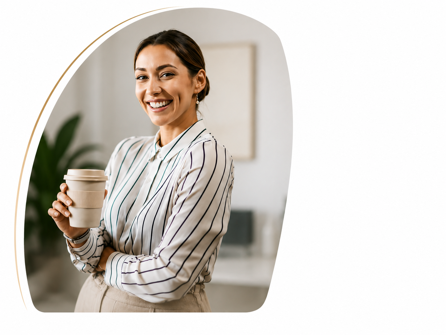 A woman in a striped shirt is holding a cup of coffee and smiling.