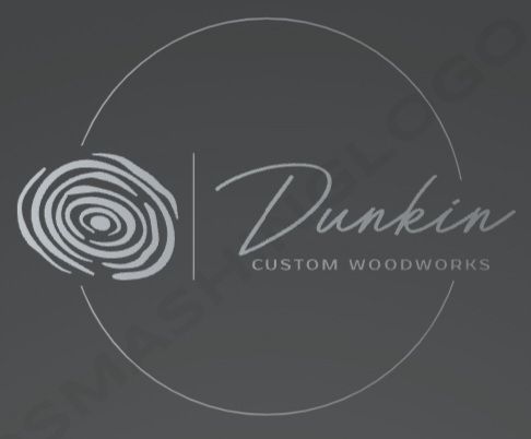 A logo for dunkin custom woodworks with a tree stump in the center