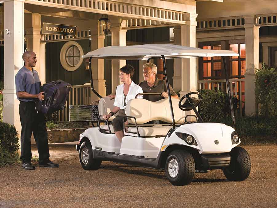 Golf Cart Service — Couple Riding Golf Cart in Reno, NV