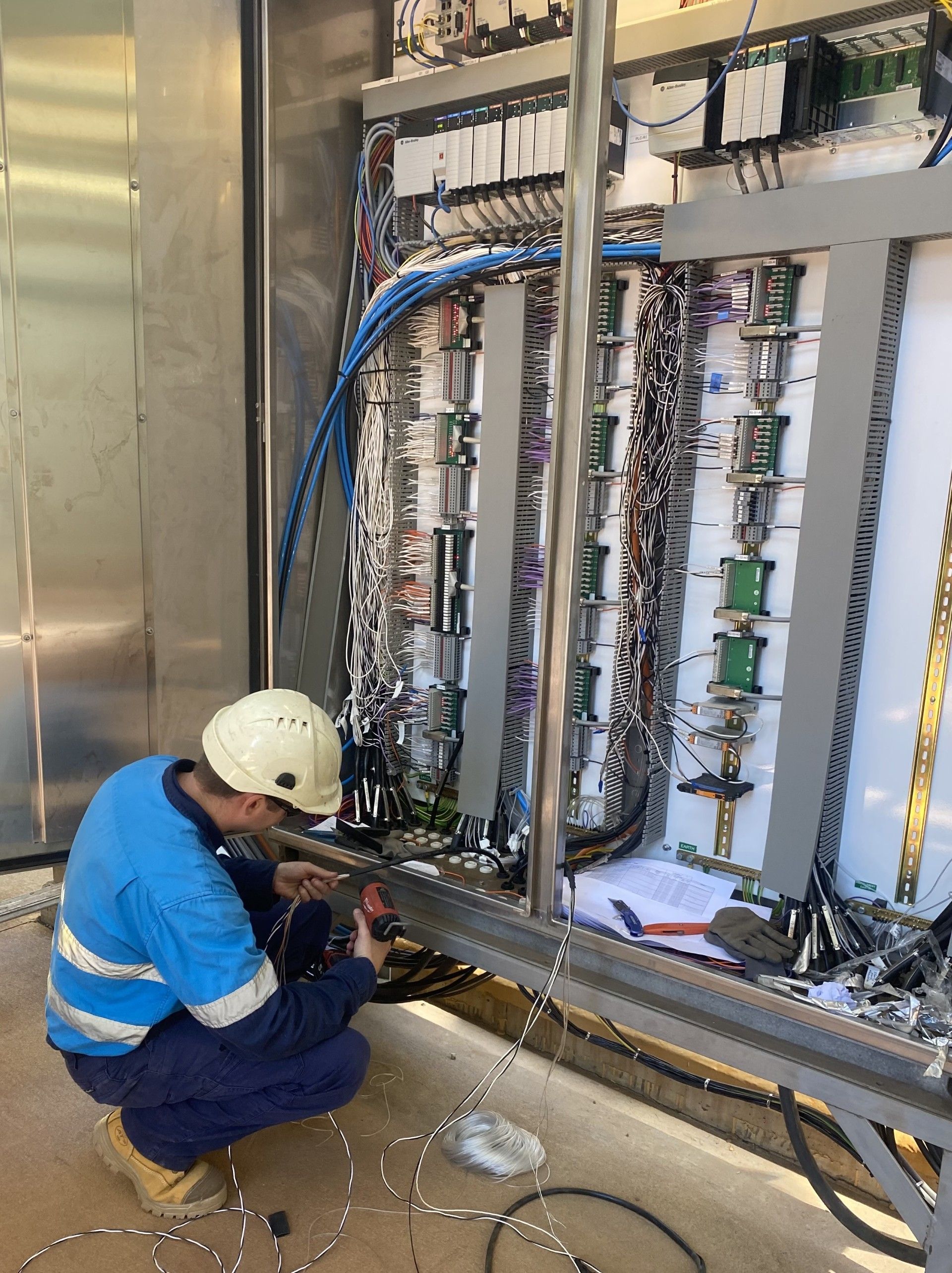Male Worker Speaking with Female Client About Air Conditioner — GSA Group In Garbutt, QLD