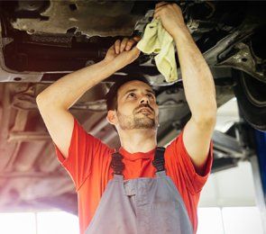 Transmission Services — Car Mechanics Working and Maintaining Car in Clarksburg, WV