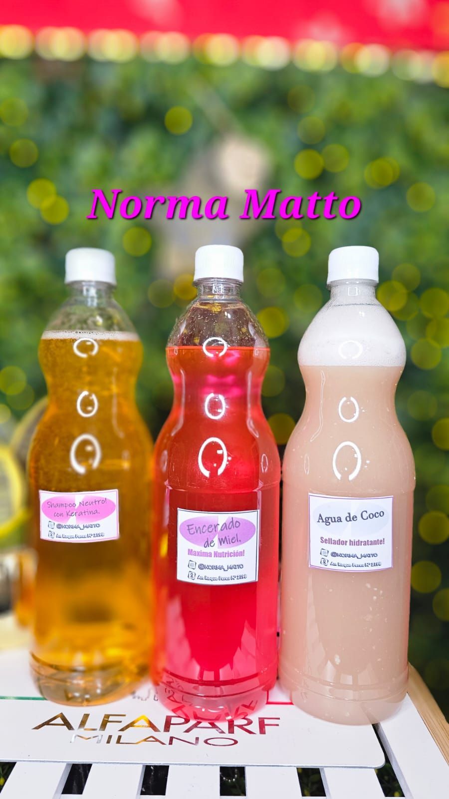 Tres botellas de bebidas coloridas etiquetadas como Norma Matto.