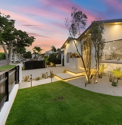 Large Excavator Removing a Tree Stump — Mareeba Crane Hire In Mareeba, QLD
