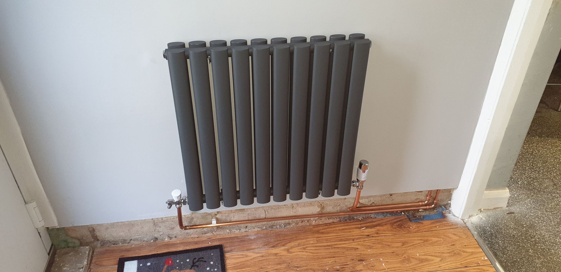 Anthracite grey radiator, radiator install, plumbing & heating