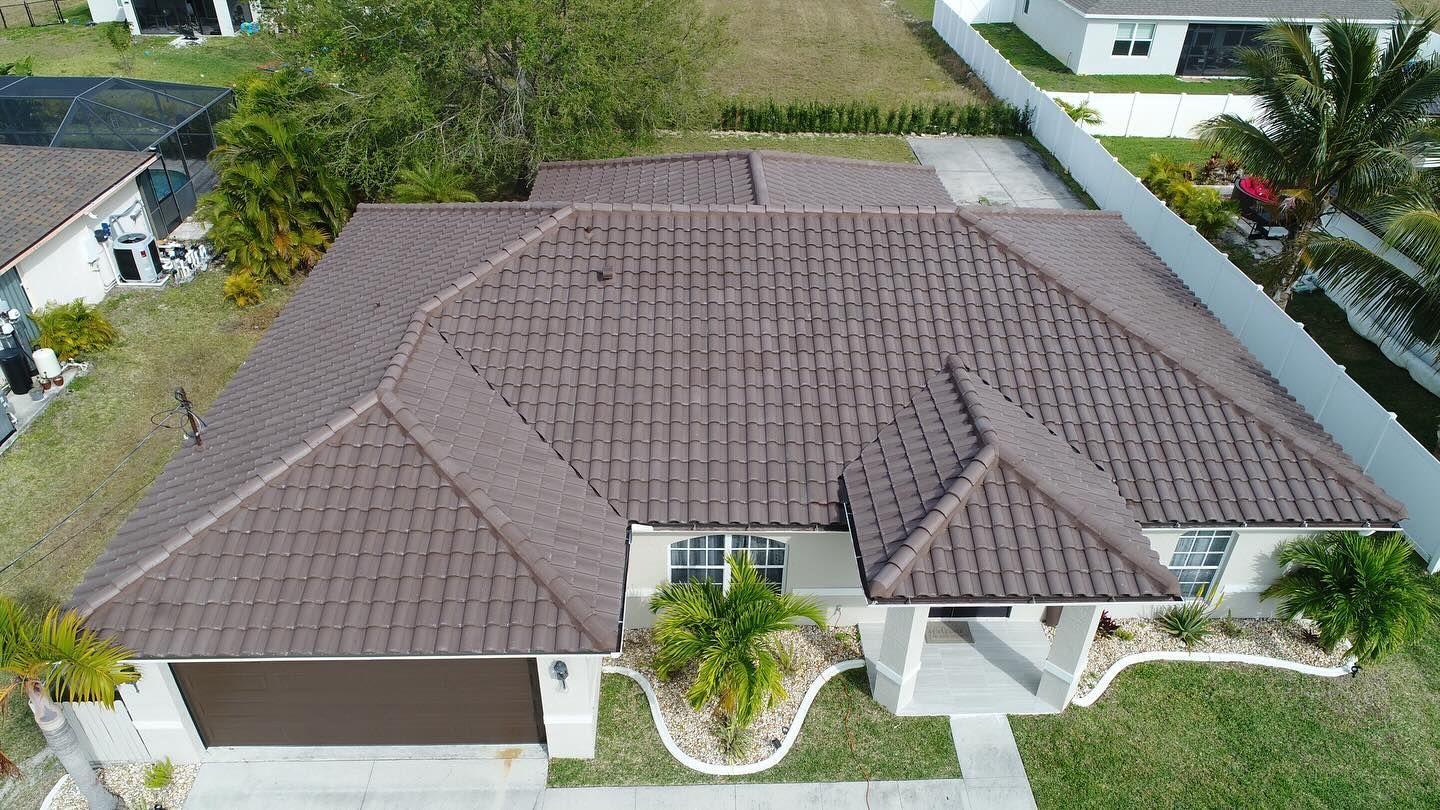 An aerial view of a house with a tiled roof.