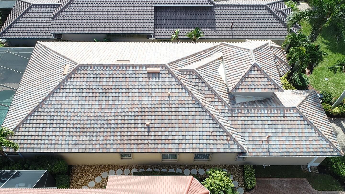 An aerial view of a house with a tiled roof