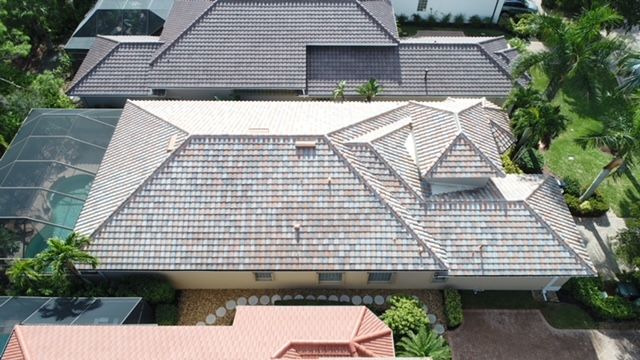 An aerial view of a house with a tiled roof.