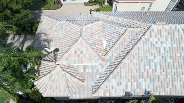 An aerial view of a house with a tiled roof.