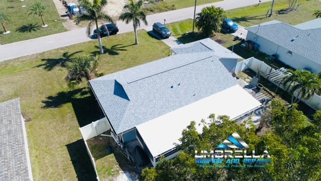 An aerial view of a house in a residential area