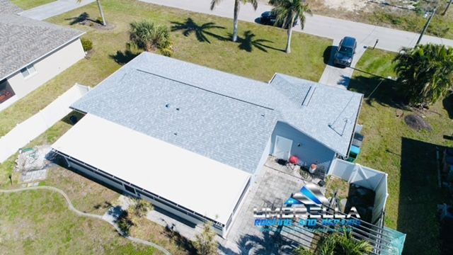 An aerial view of a house with a new roof