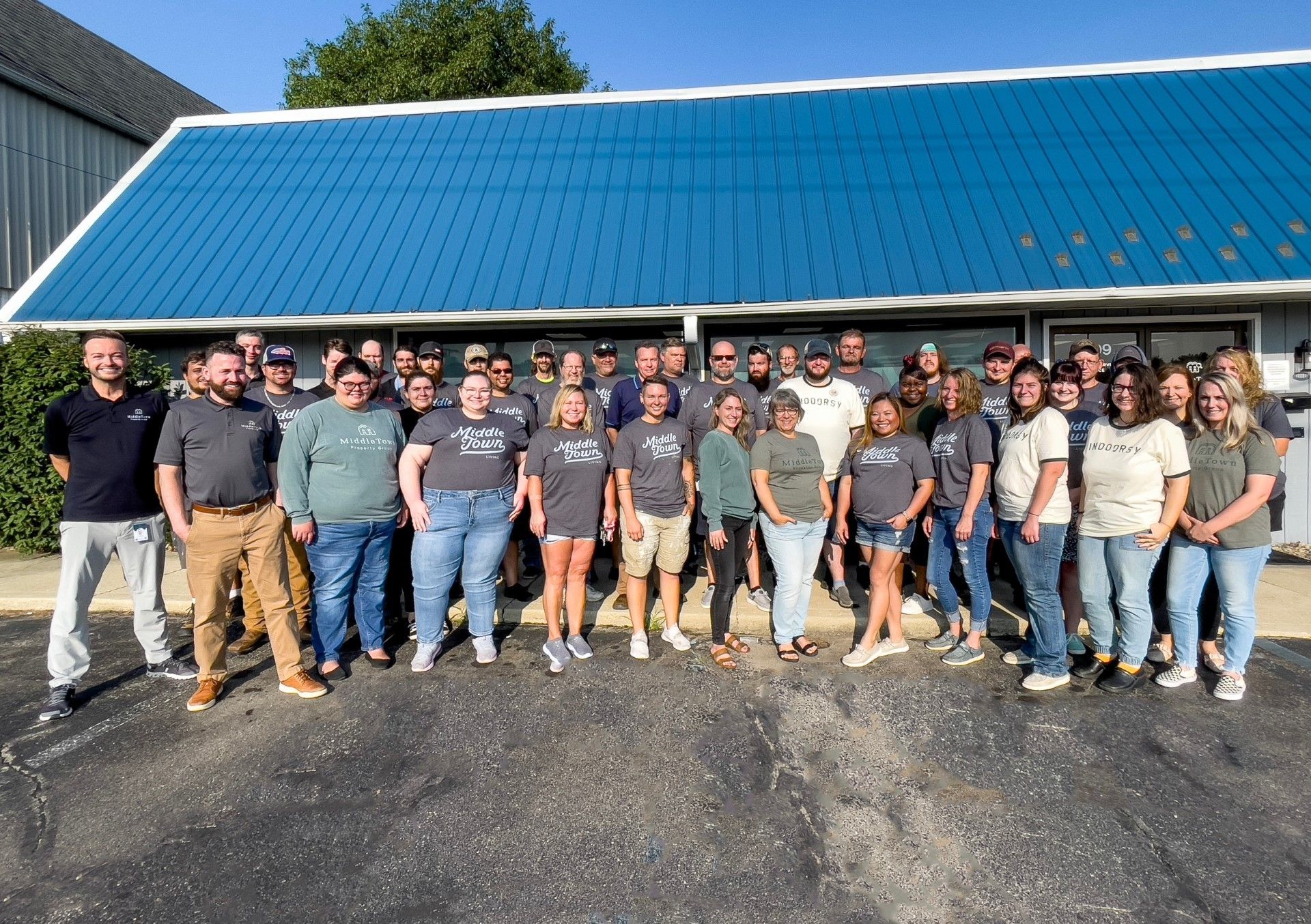 About 30 MiddleTown employees in front of our main office.