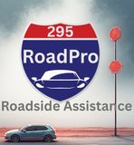 A roadside assistance logo featuring an interstate sign reading 