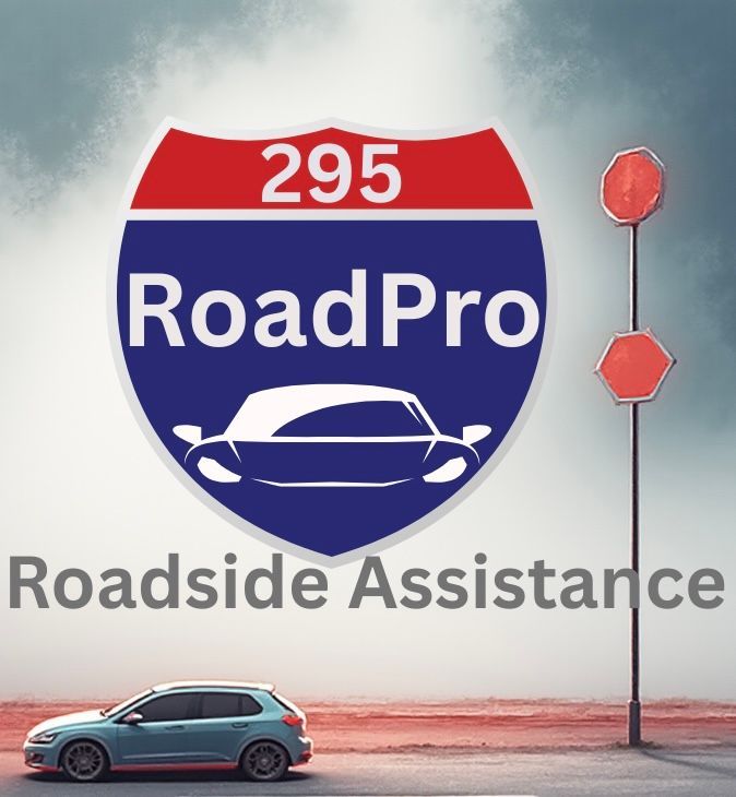 A roadside assistance logo featuring an interstate sign reading 