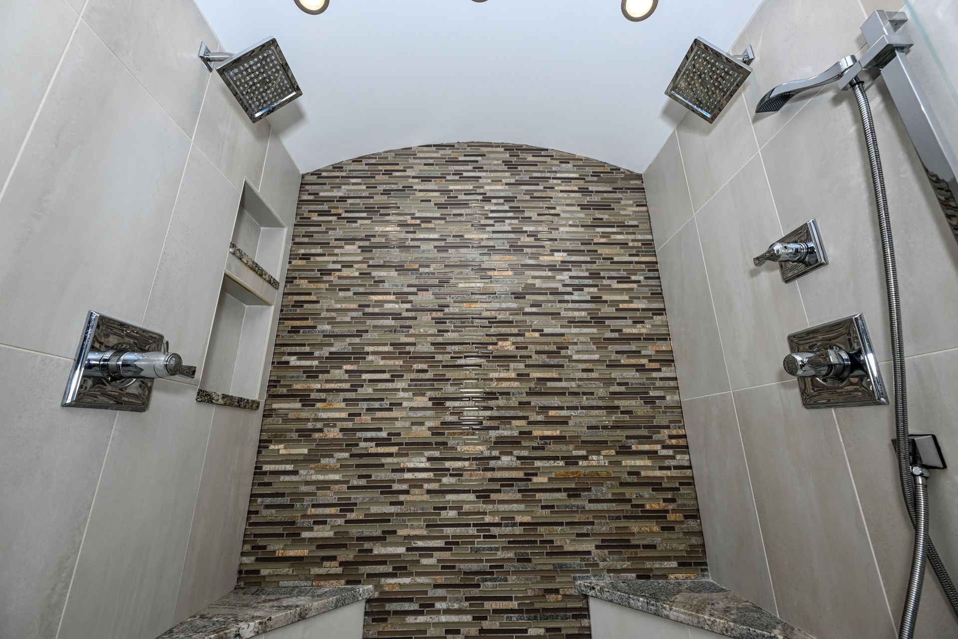 Custom walk-in shower with two shower heads