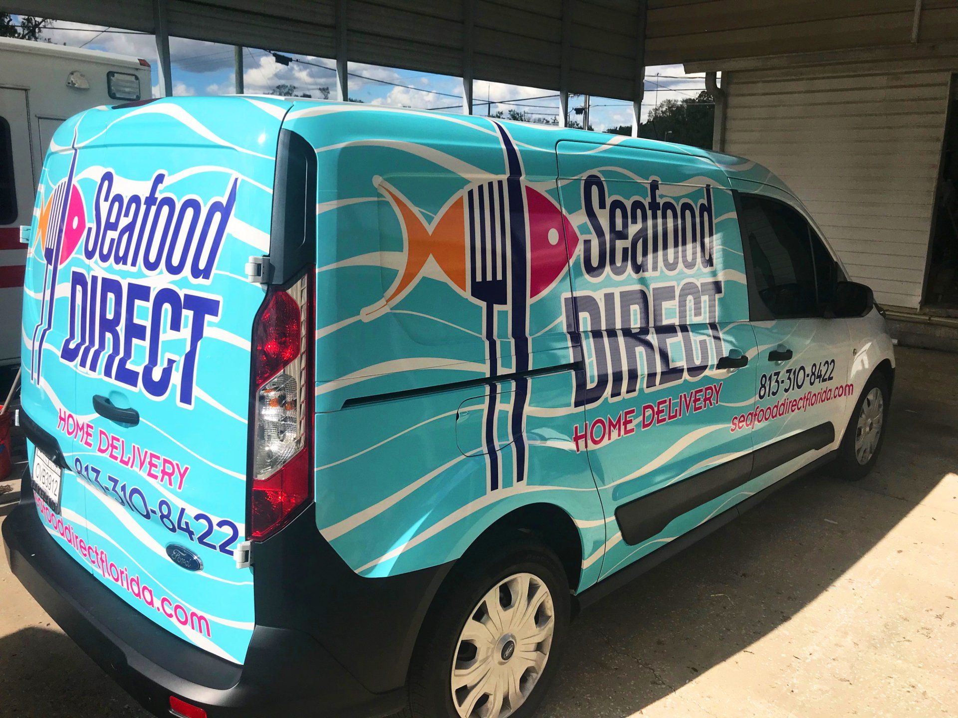Sample of a truck wrap design for a seafood delivery service.
