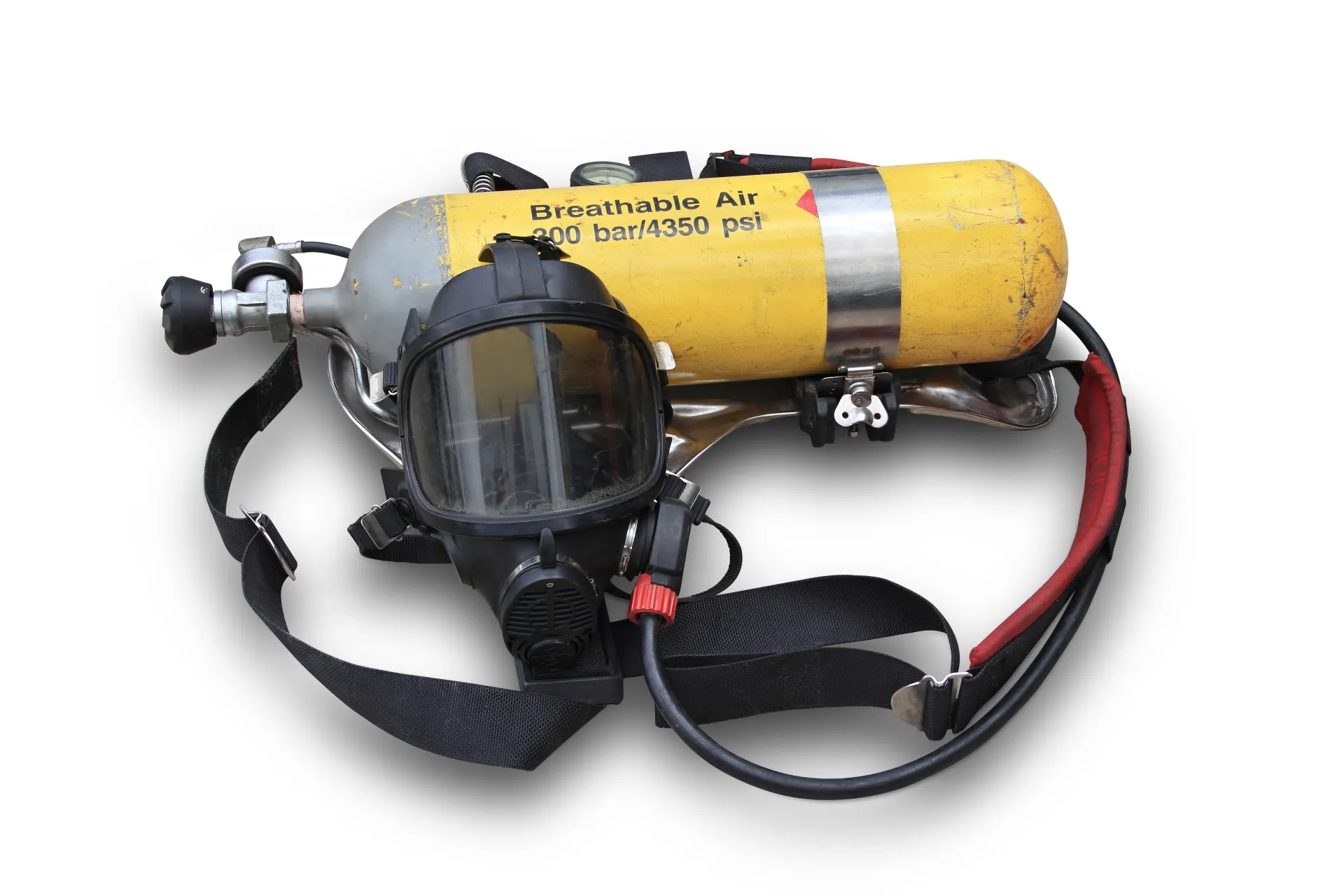 A yellow scuba tank with a mask attached to it