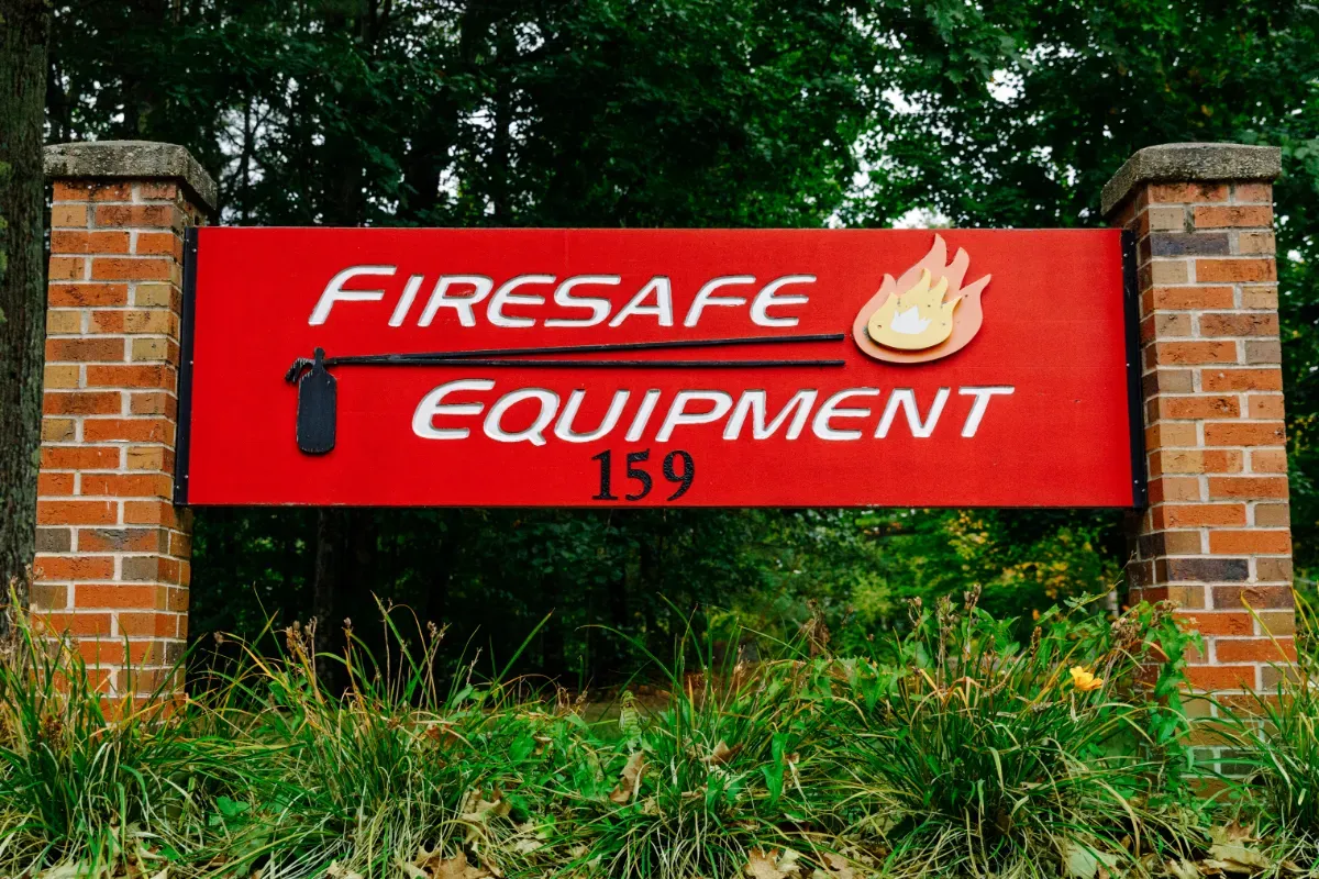 A red sign that says firesafe equipment on it