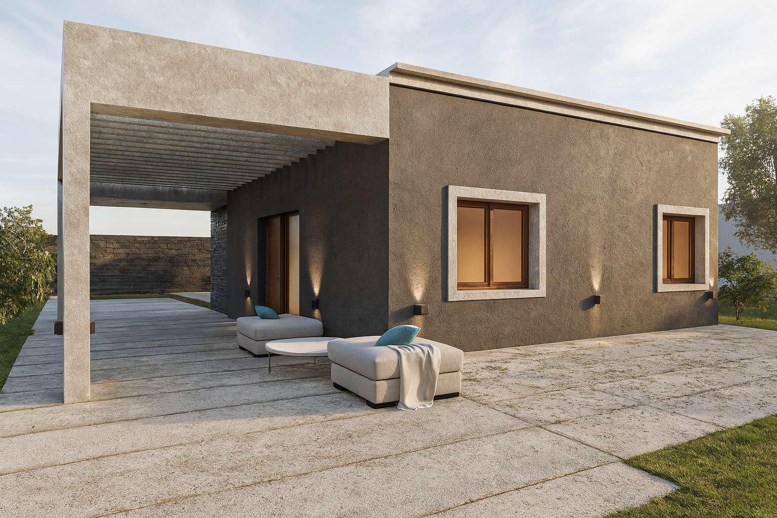 Una casa de una sola planta con paredes de textura oscura y un patio cubierto, con suelos de piedra 