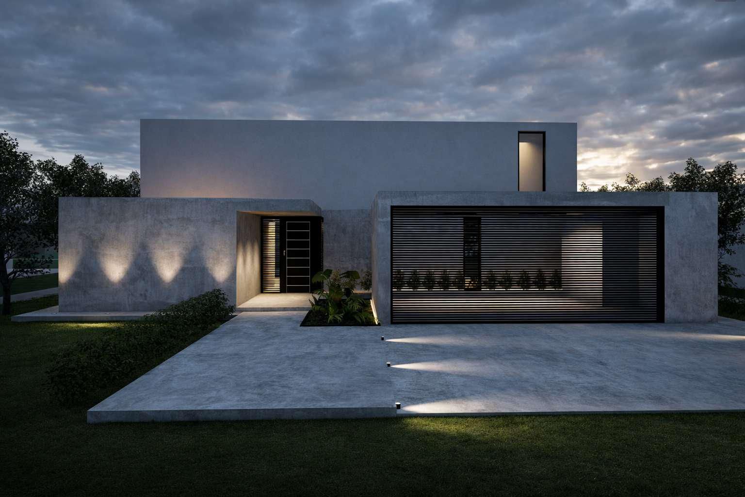 Una moderna casa de dos plantas de hormigón gris al anochecer, con detalles de pared iluminados