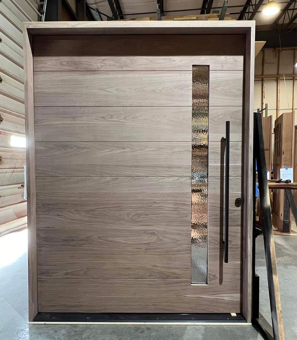 #28618  
72x96 Walnut Pivot Door
Single Lite Flush Door with horizontal grain and V grooves. 