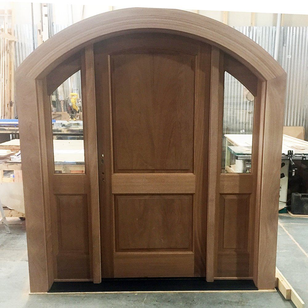 Arch top solid mahogany two panel door with sidelites