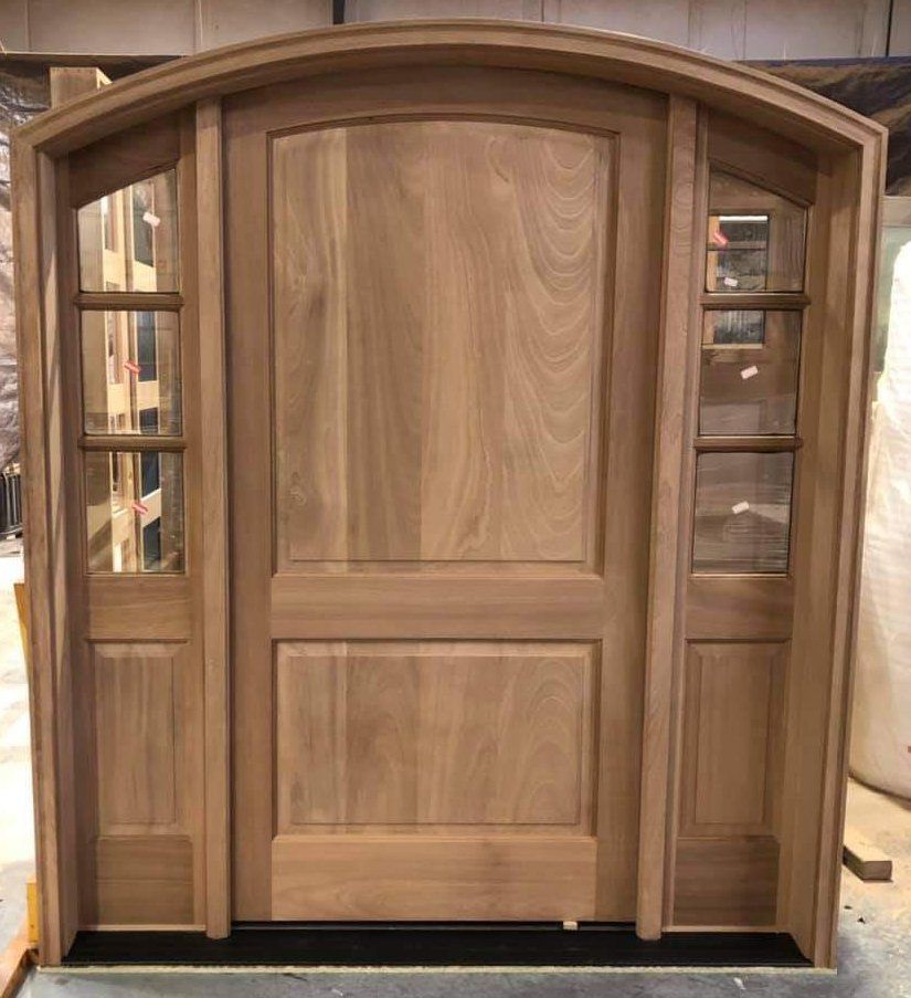 Front Entry Mahogany Door - eyebrow arch with sidelights