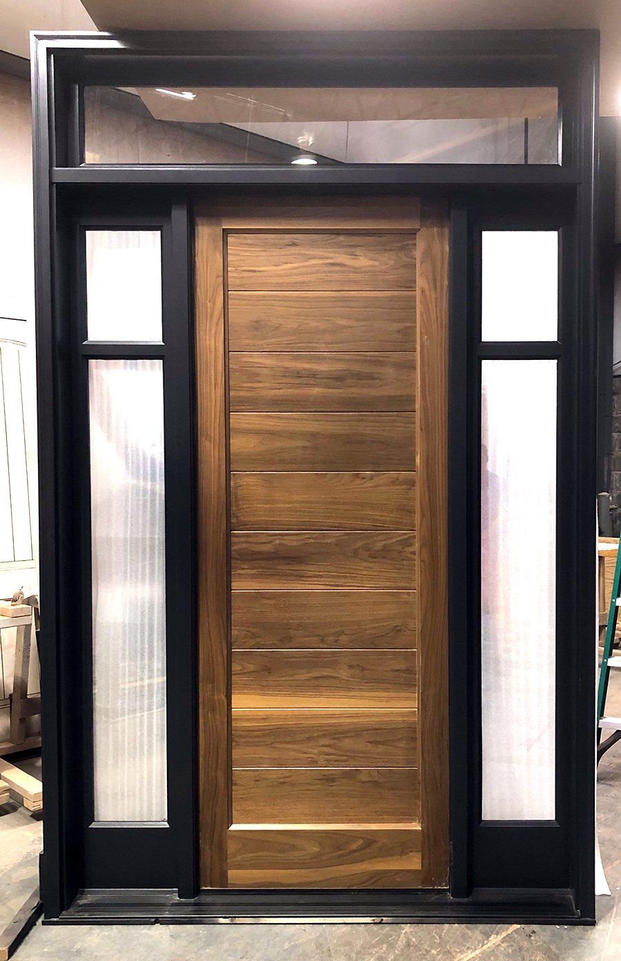 Solid Walnut planked door with mahogany frame and sidelites