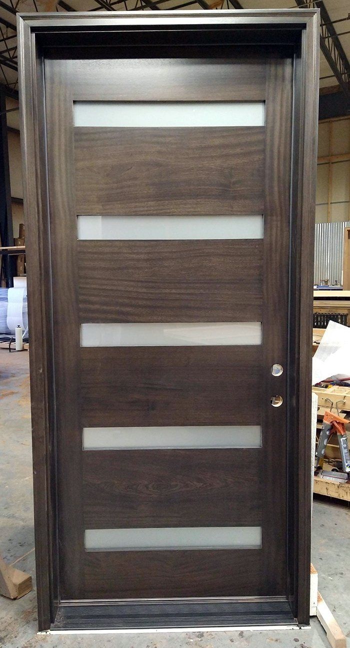 Modern silicon drive front door finished in dark chocolate