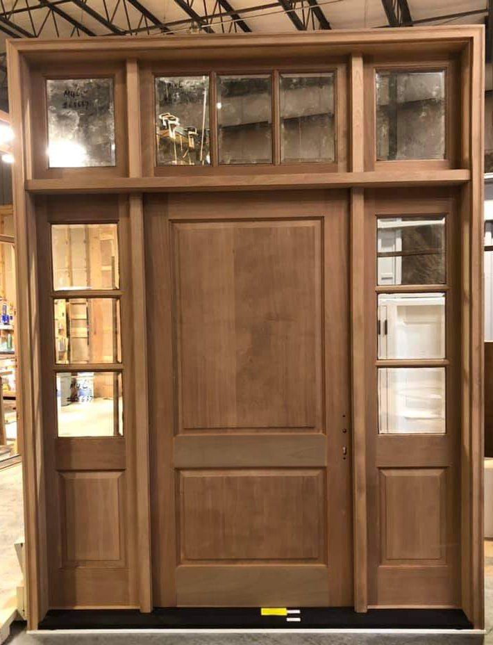 Mahogany front door with sidelites and transom DP-50 rated