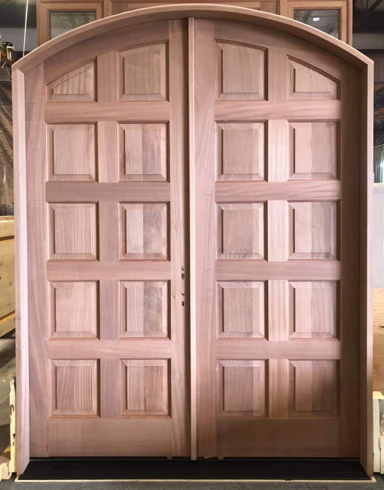 Mahogany eyebrow top double doors shown unfinished
