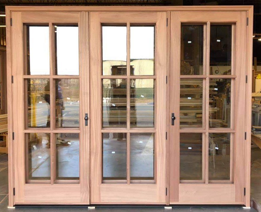 Exterior French door unit with built-in storm doors