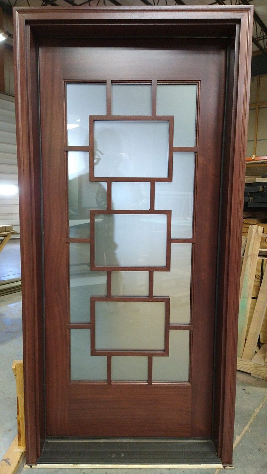 Contemporary mahogany door with unique glass pattern