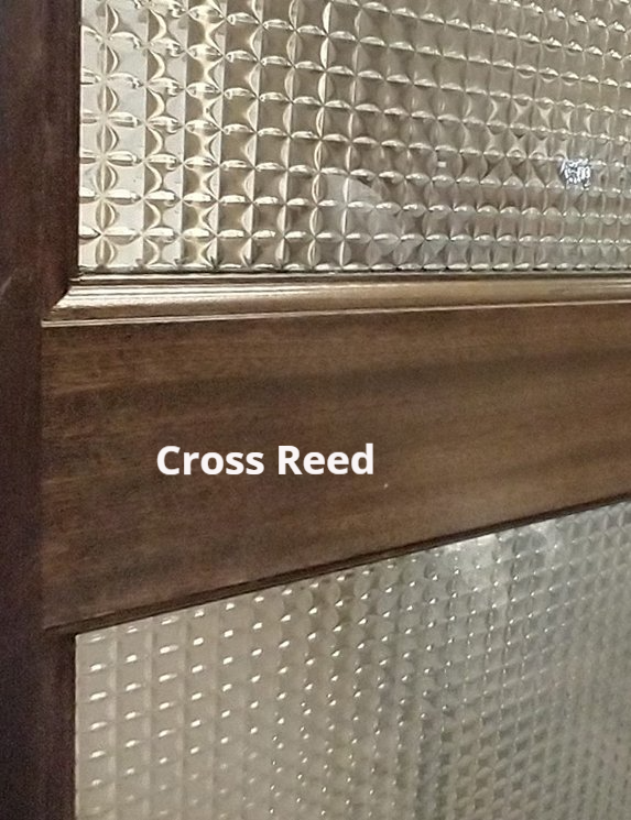 A close up of a door with the word cross reed on it