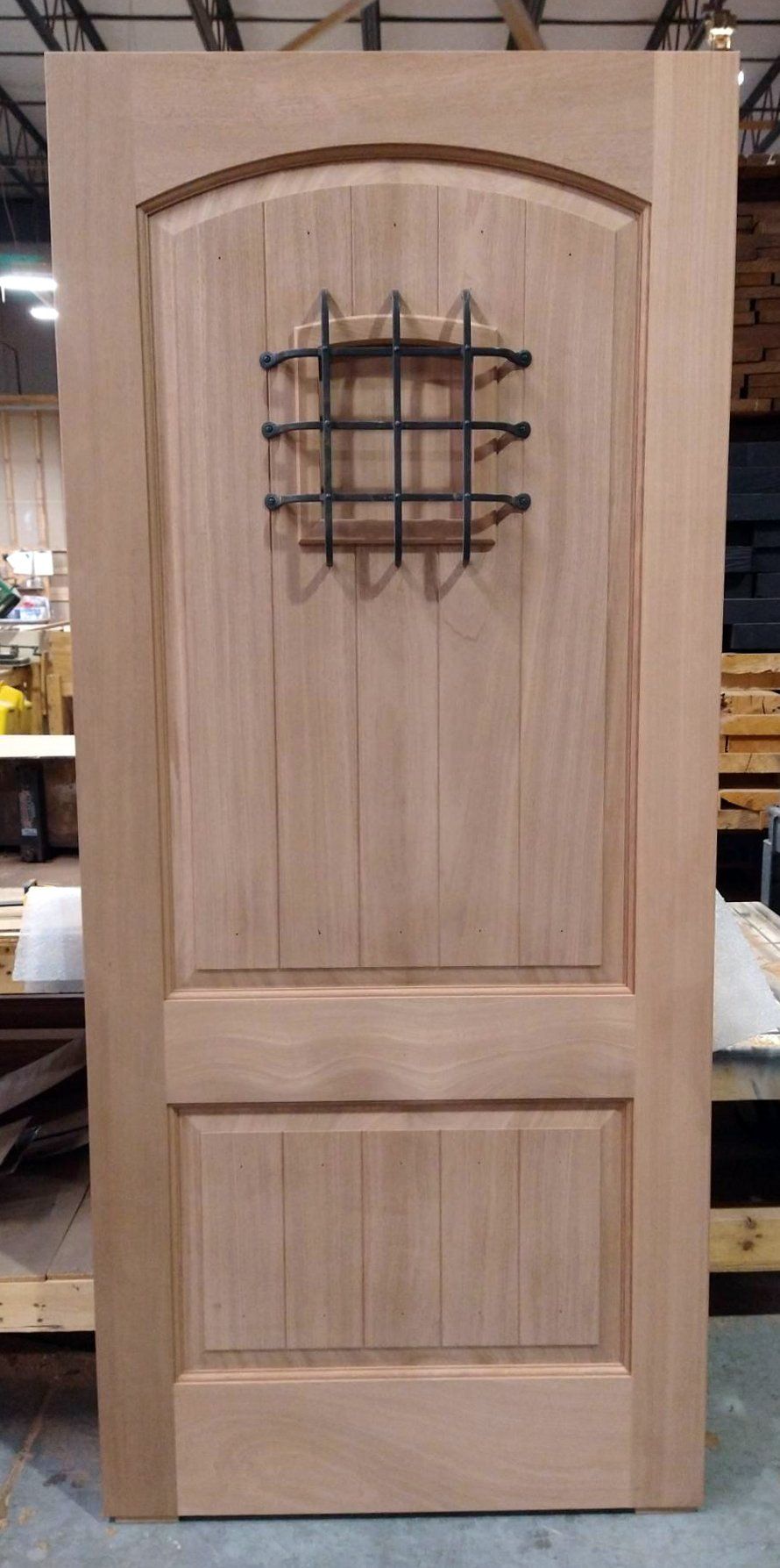 Mahogany door slab with speakeasy