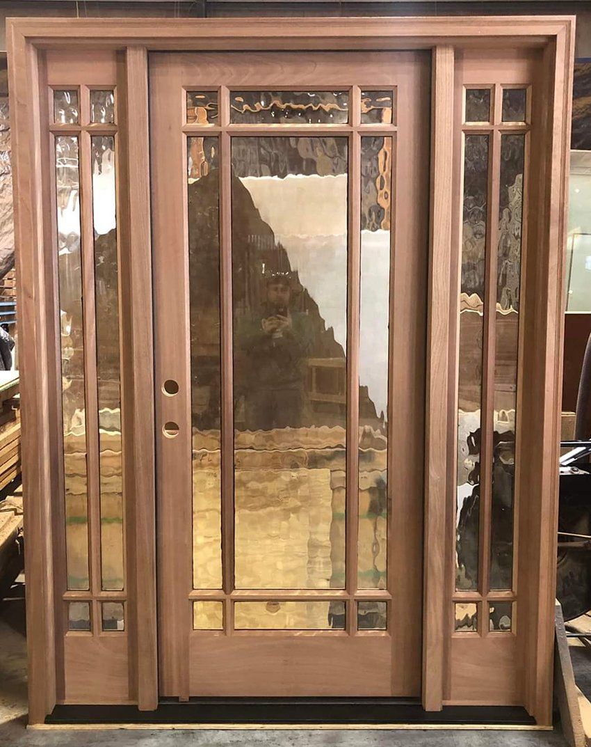 Mahogany 9 lite entry door with matching sidelights