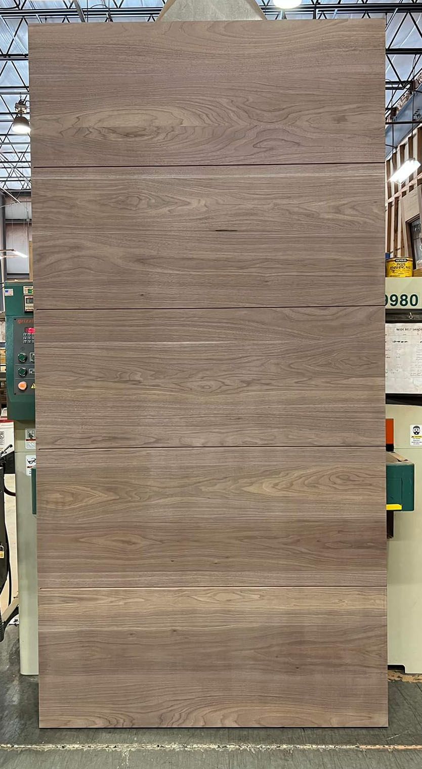 Walnut flush pivot door