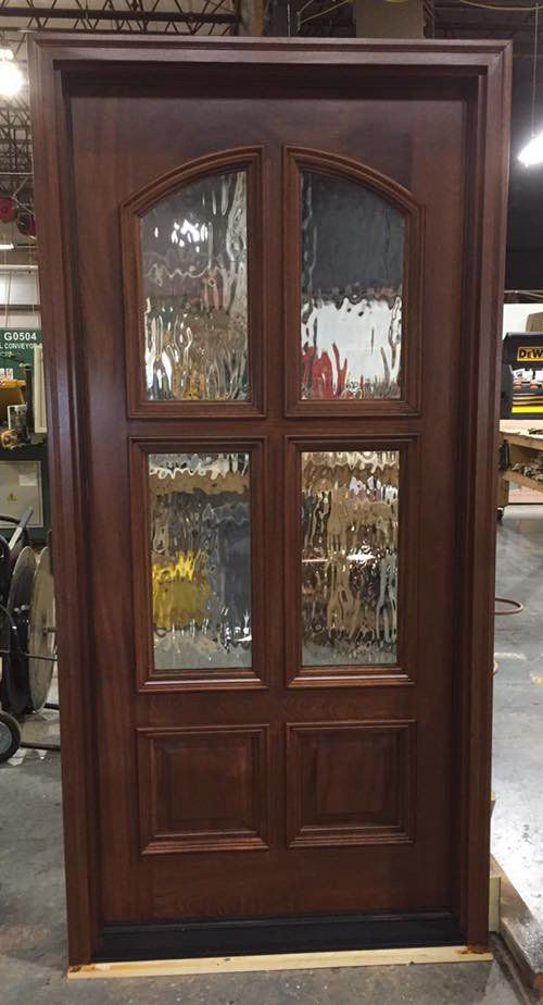 4 Lite door Mahogany wood door with Flemish style glass.  Two top lites are arched.