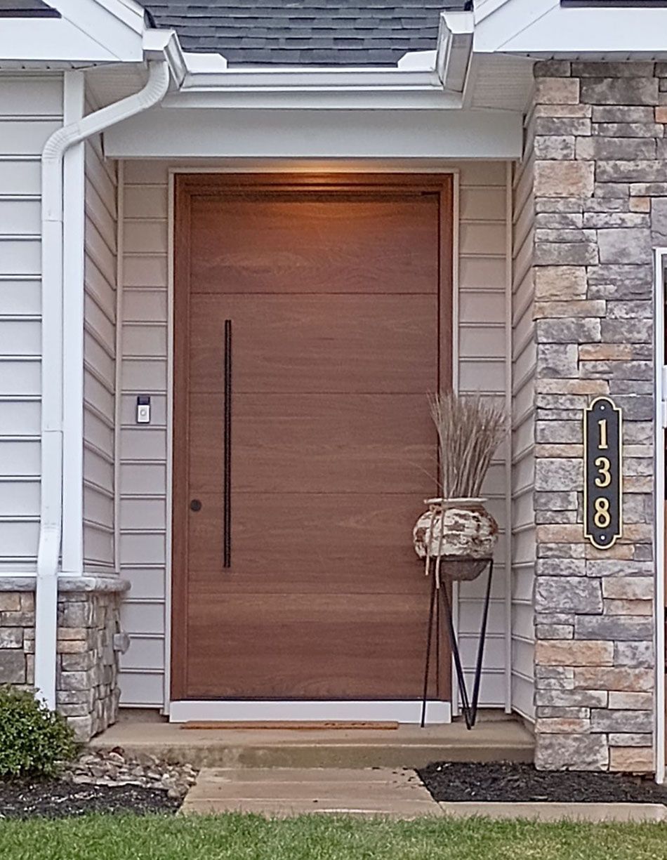 Adamson #28123
Walnut flush door finished in clear
Hoppe contemporary lock system & pulls