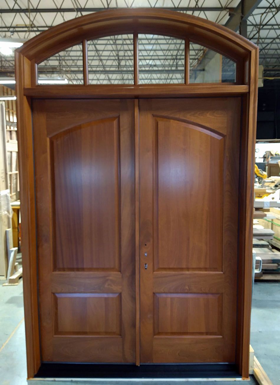 Solid Mahogany double doors with arched transom