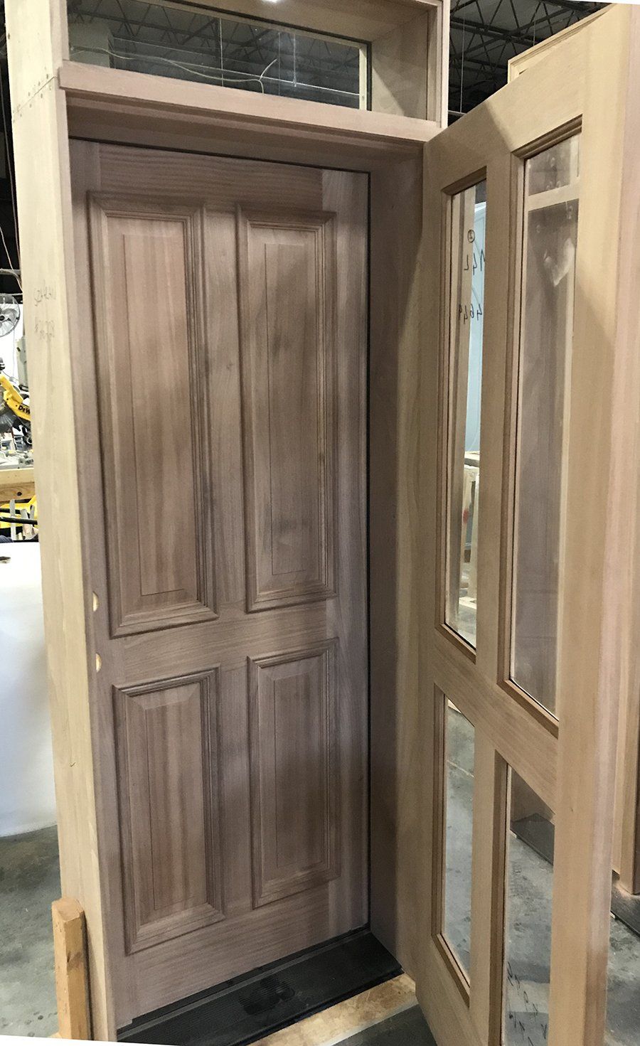 Mahogany 4 panel entry door with custom storm door
