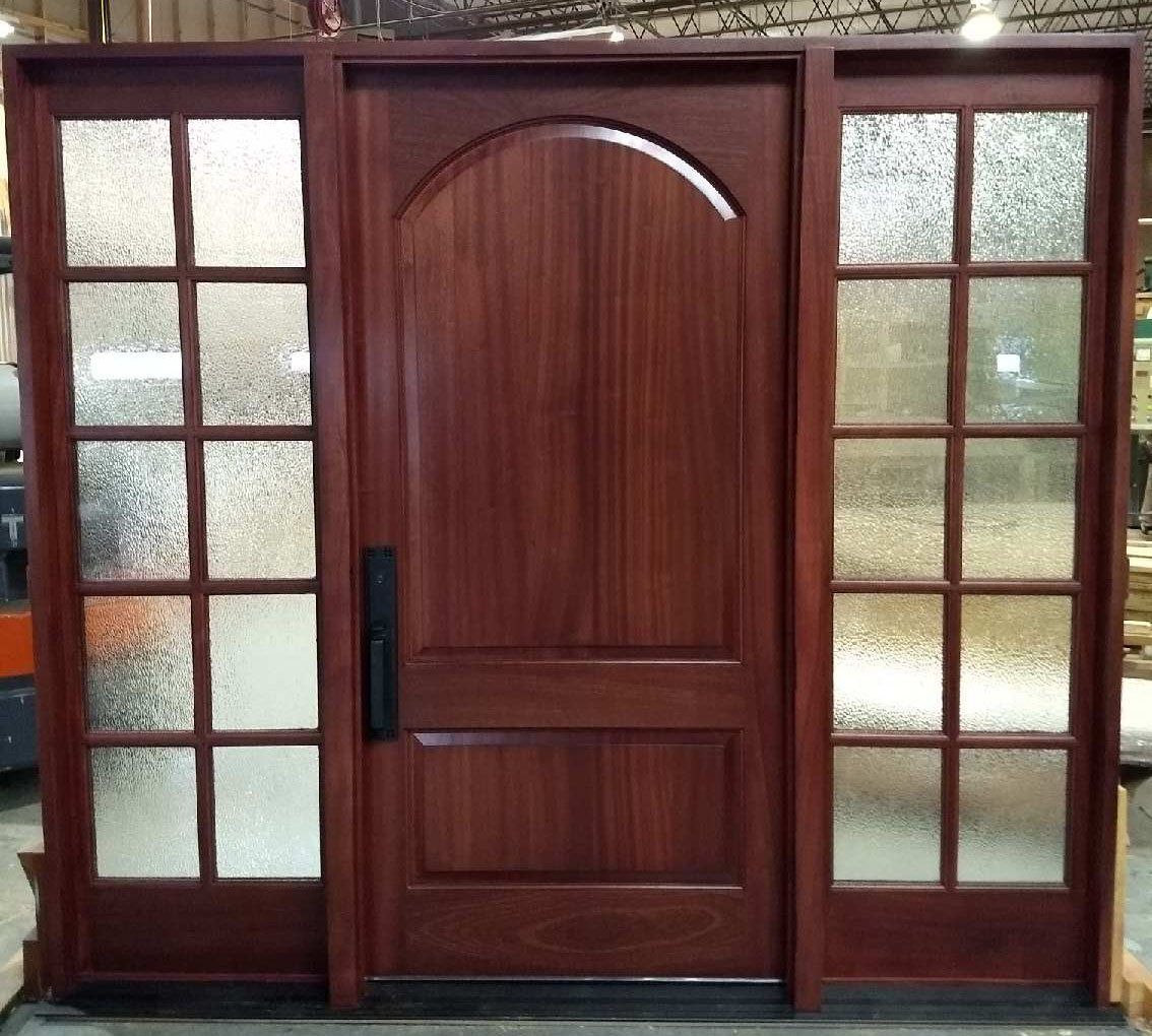 Solid wood door flanked by two 24