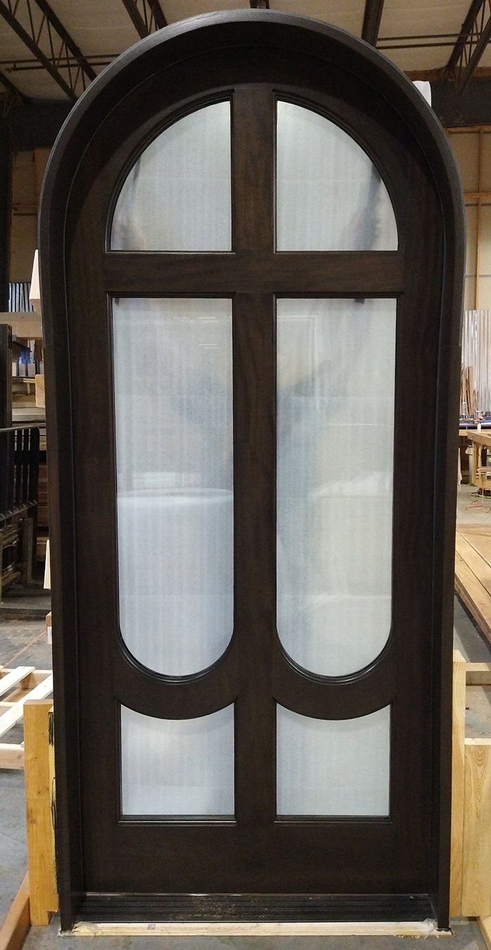 Round top mahogany door stained in dark chocolate
