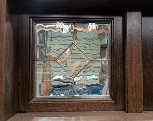 Matthews #28718
Mahogany door
Flemish, Zinc caming, & Electronic switchable center glass panel
Finished in Minwax Ebony #2718