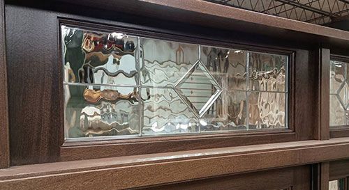 Matthews #28718
Mahogany door
Flemish, Zinc caming, & Electronic switchable center glass panel
Finished in Minwax Ebony #2718